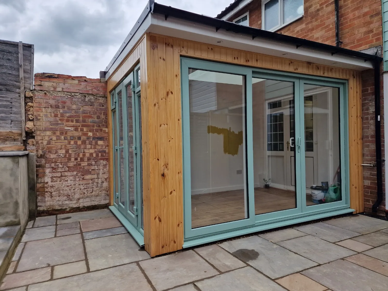 Rear sun room and patio in Barnham Slough